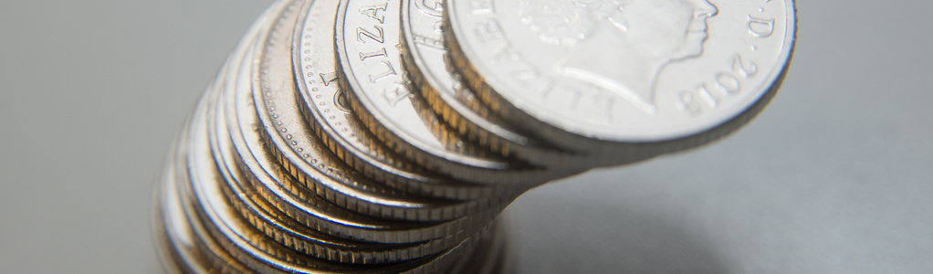 balancing coins (cropped)
